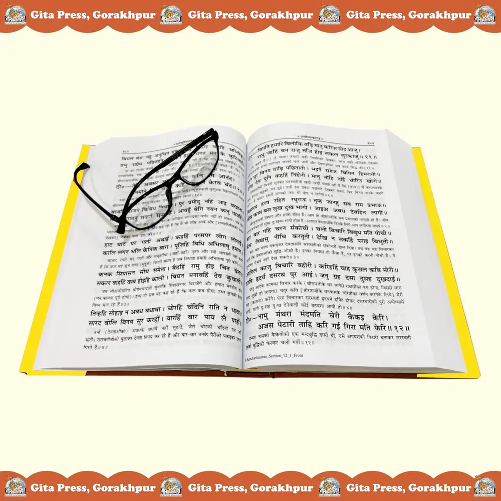 The open book with reading glasses on the page