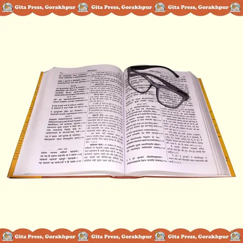 Open book with reading glasses on the page