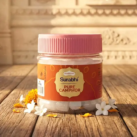 Jar on a wooden table with flowers