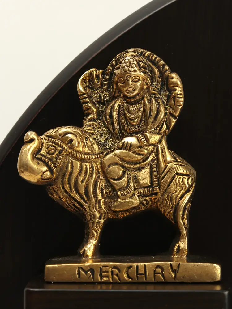Mercury figure with the name on its base