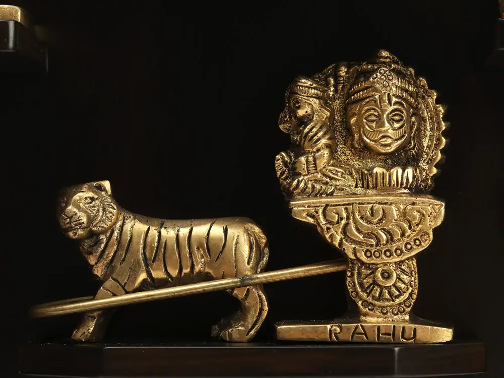 Rahu with a tiger on its base