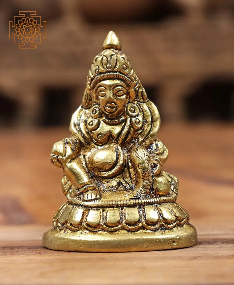 Small seated brass Kubera, front view
