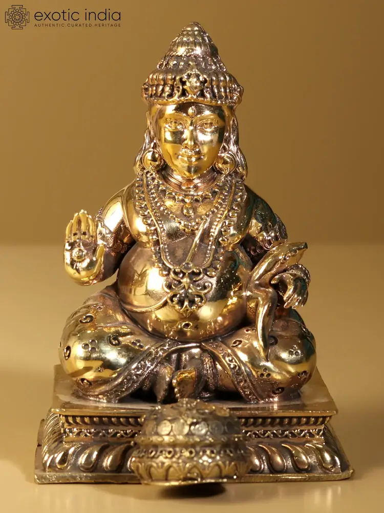Gold brass Kubera statue from the front