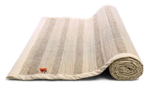 The mat partly unrolled on the floor