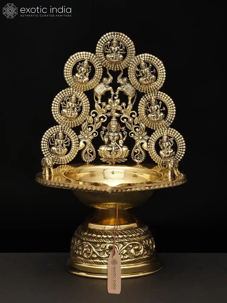 Brass Ashtalakshmi lamp from the front on black
