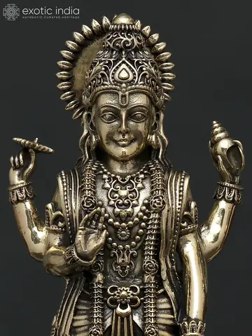 Close view of Vishnu's face and crown