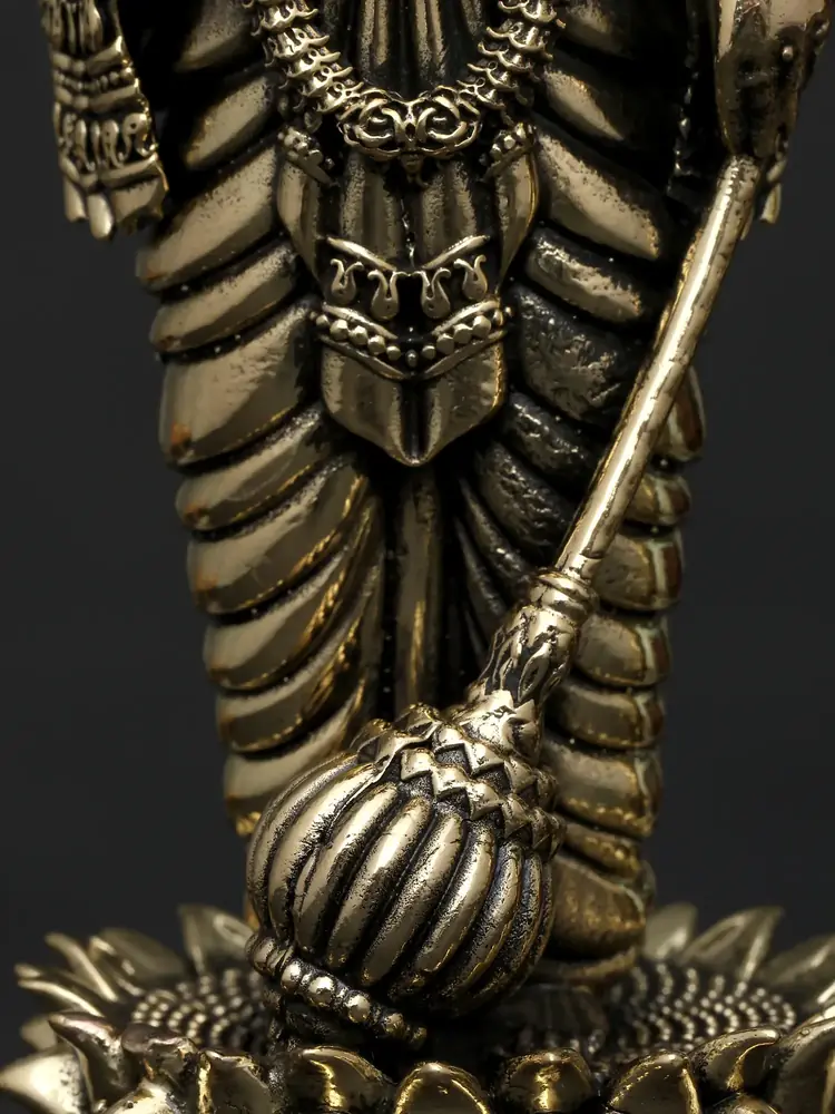 Close view of the mace and lotus base