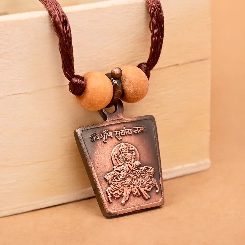 The deity side on a brown cord with two beads