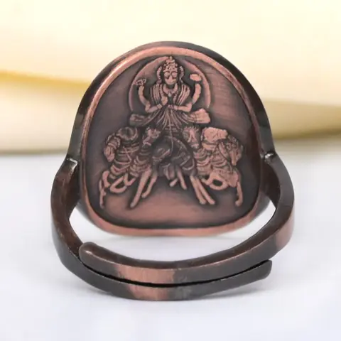 The back of the ring with a deity figure engraved