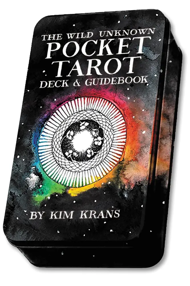 Black Wild Unknown Pocket Tarot tin with a ringed sun on the lid