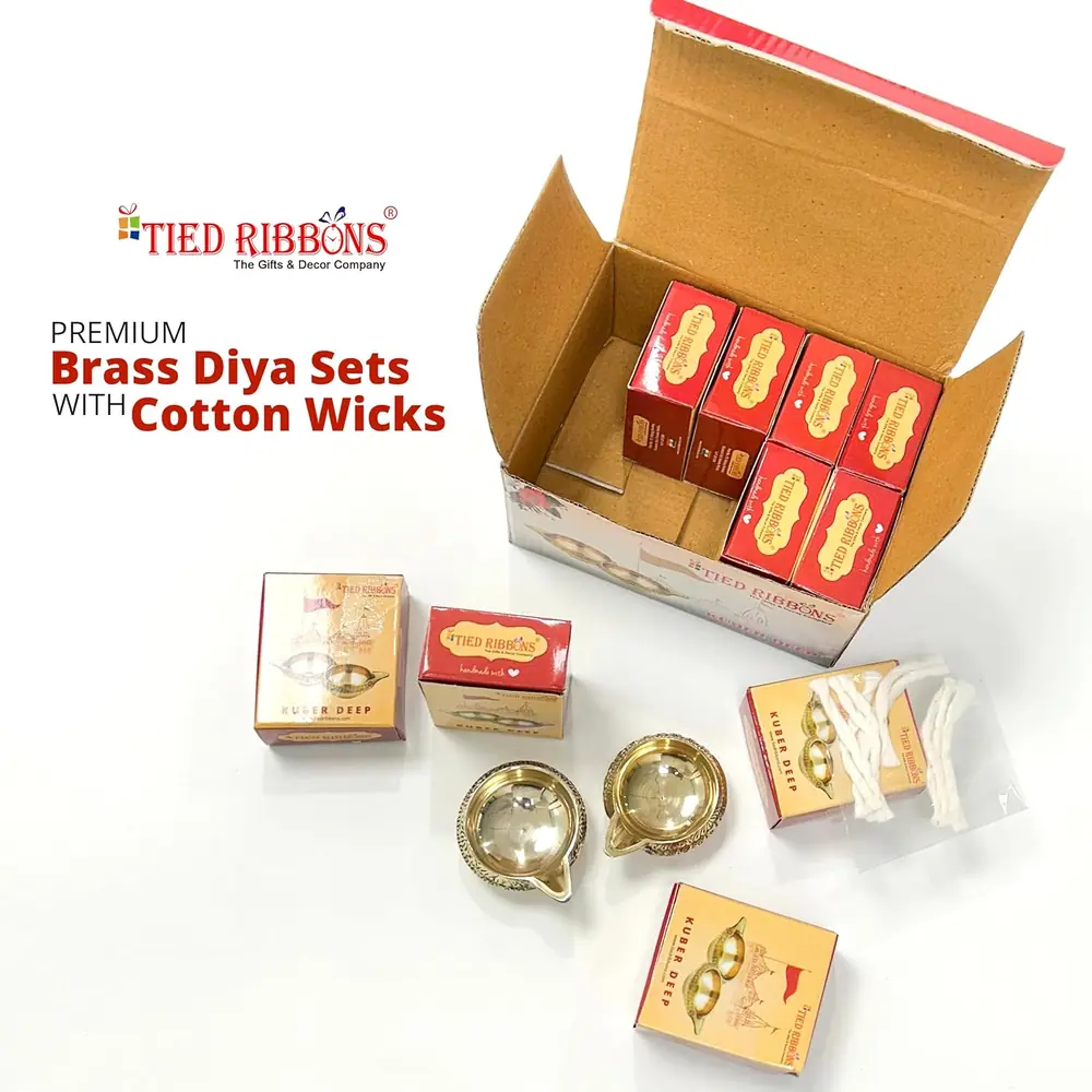 The open box with diyas and cotton wicks
