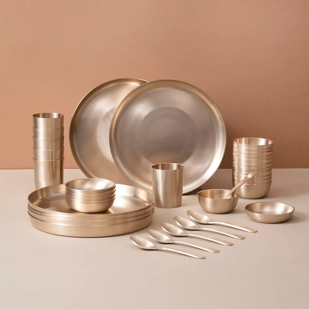 The full 36 piece kansa dinner set laid out together