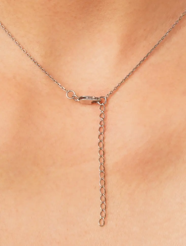 The clasp and extender chain at the back