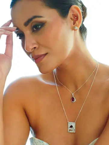 Model wearing the necklace with the pendant at the chest
