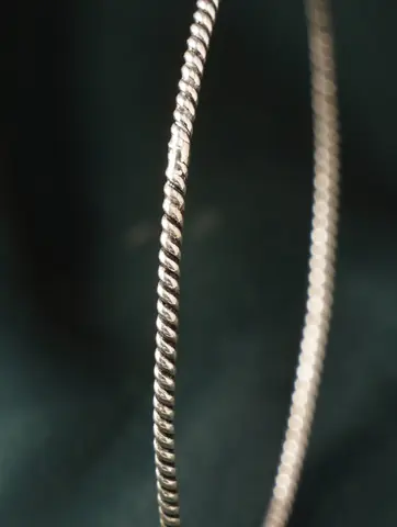 Close view of the twisted texture of the bangle