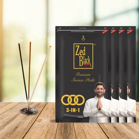 The packs on a wooden table with sticks burning
